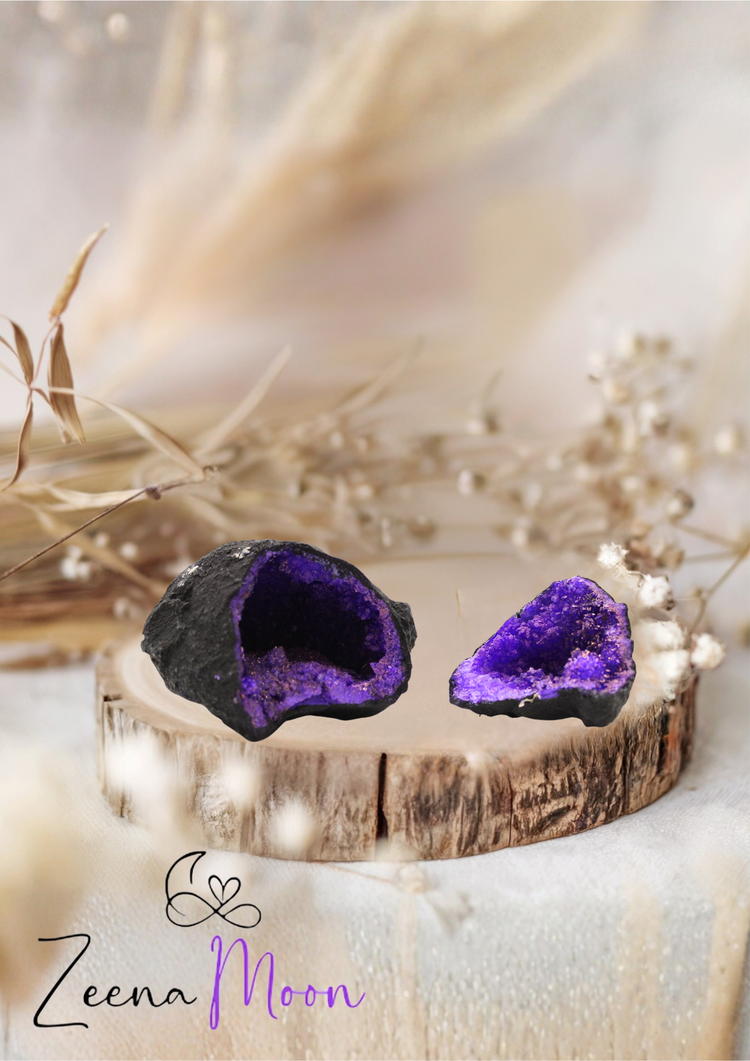 Purple coloured calcite geodes with sparkling crystal centres