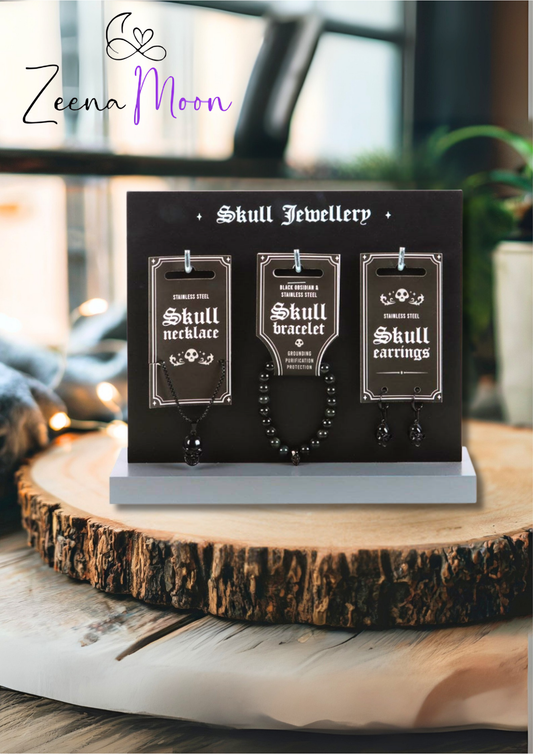 Set of 18 Black Obsidian Skull Jewellery Pieces on Display